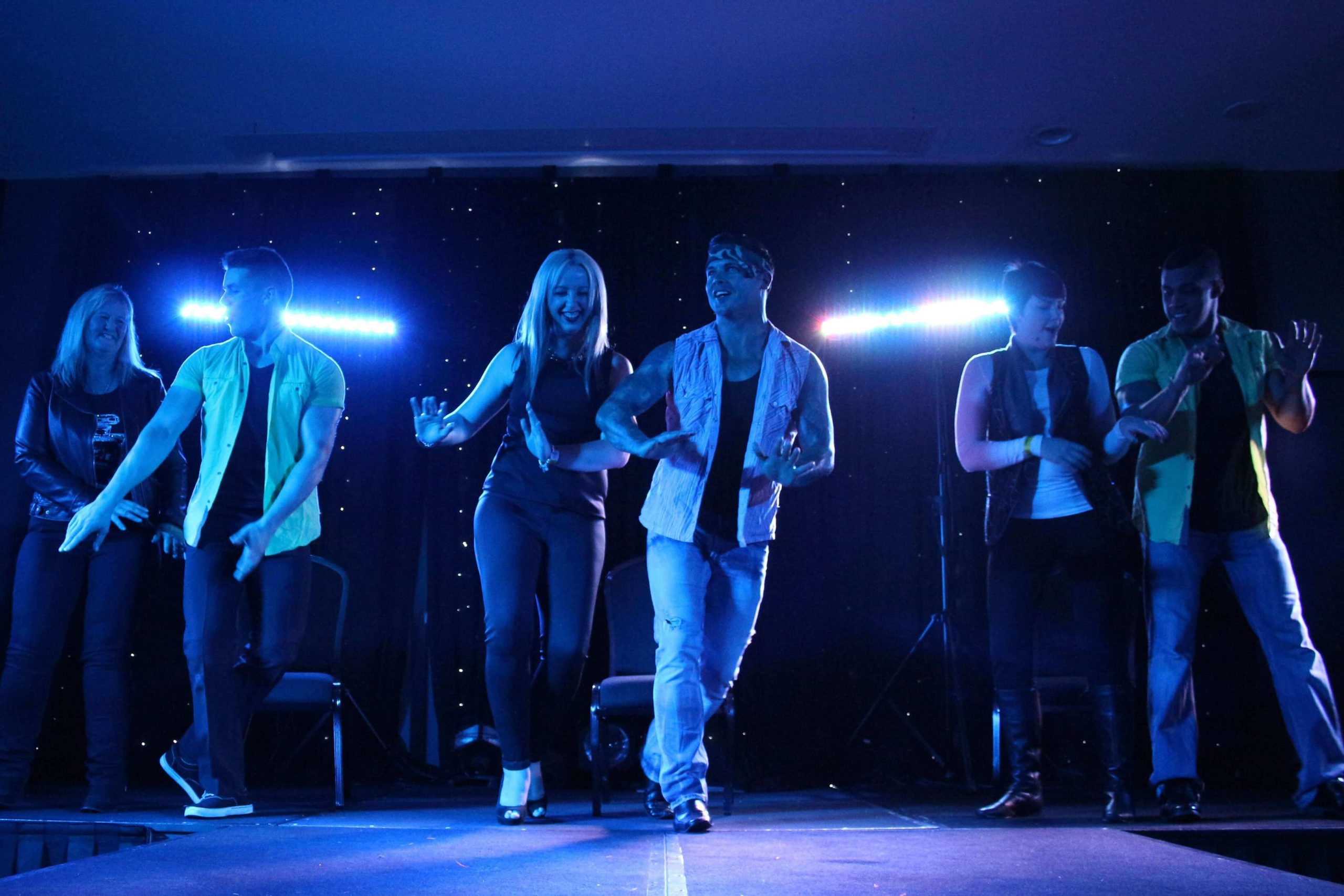 Sydney Hotshots male revue performing on stage
