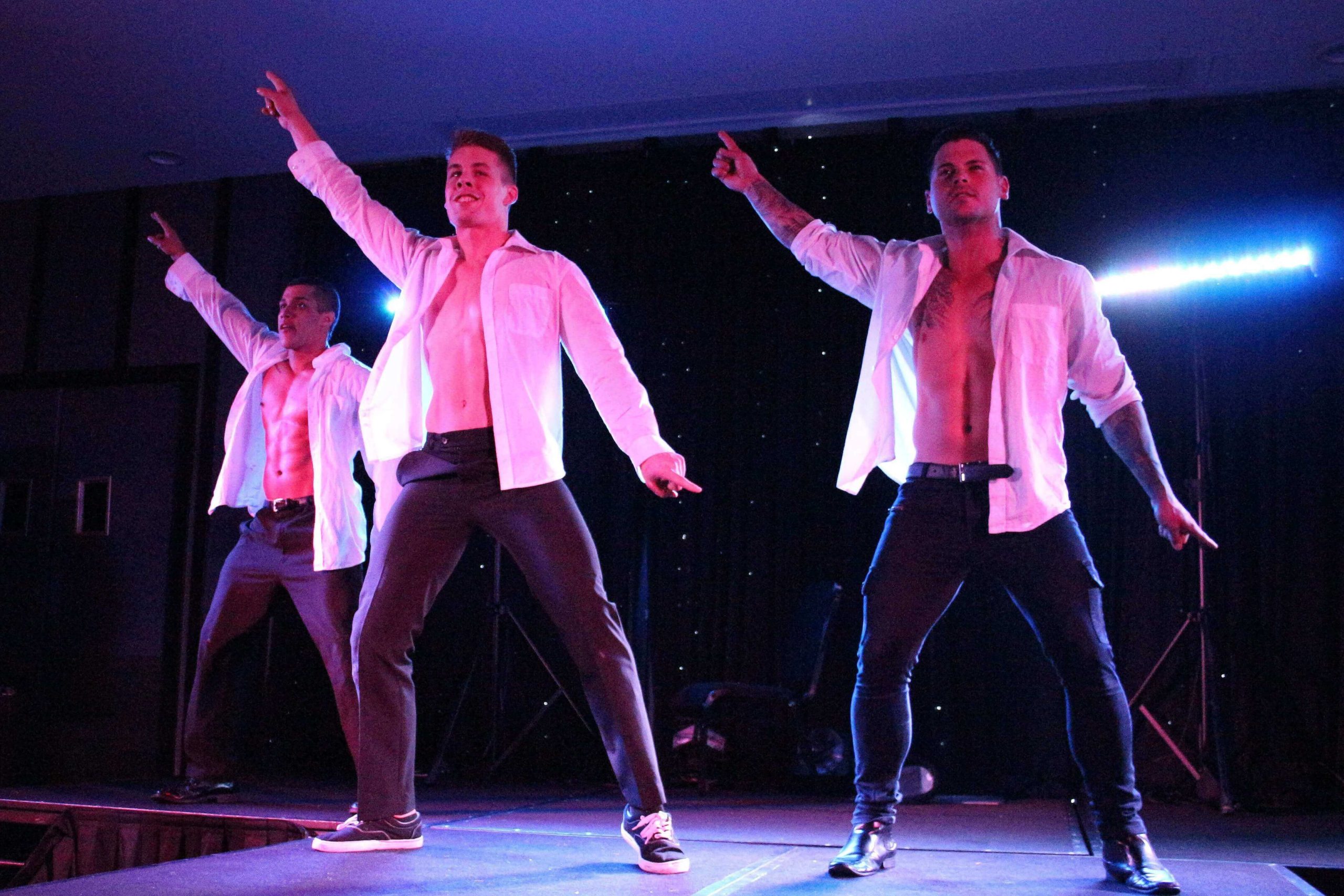 Sydney Hotshots male revue performing on stage