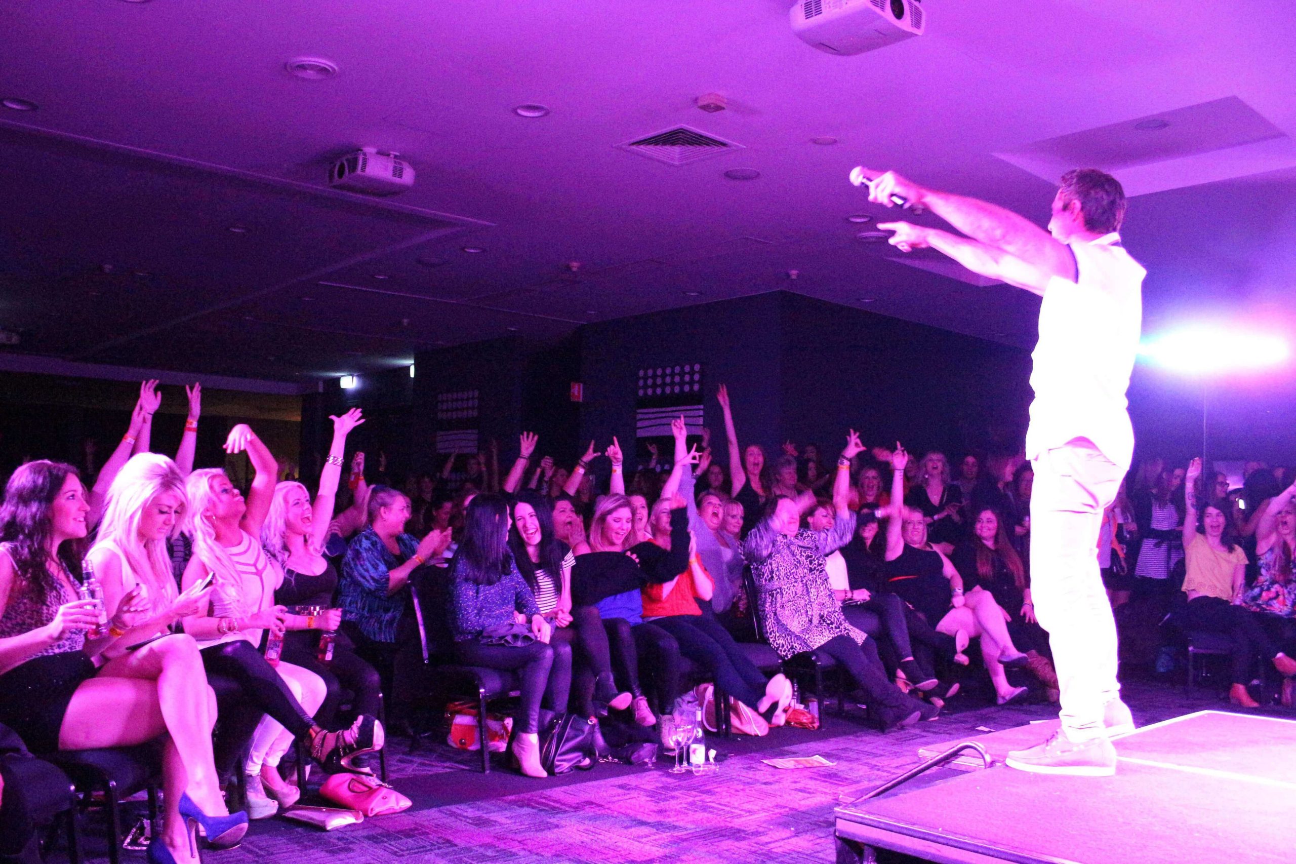 Sydney Hotshots male revue performing on stage